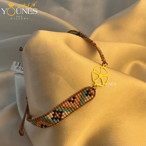 تصویر دوم دستبند میوکی گل آفتابی طلا